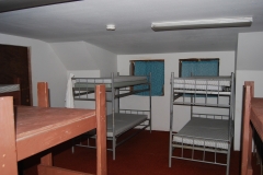 Bunks in 4 separate rooms in the dormitory